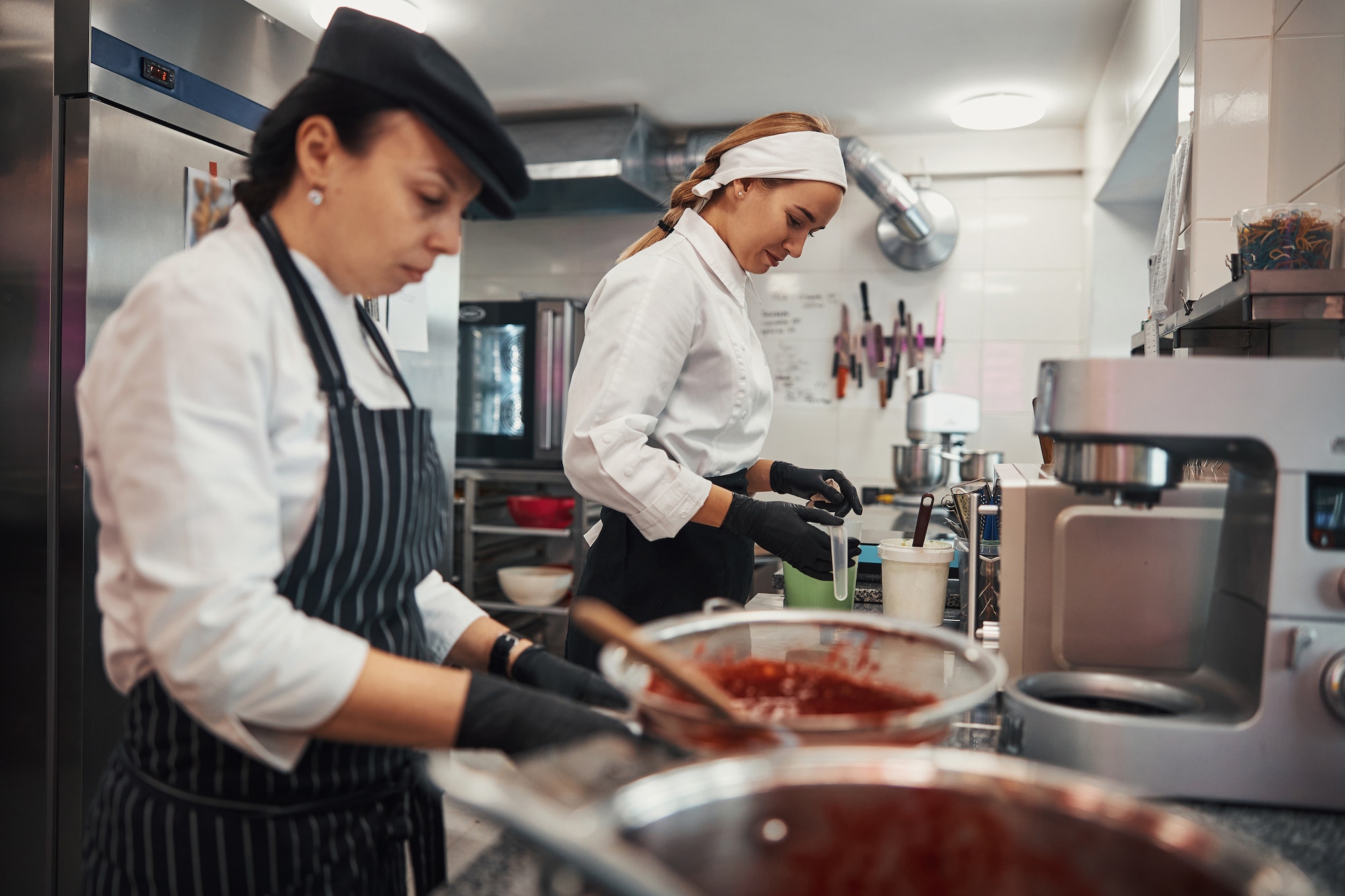 Chef and sous chef working together in the kitchen